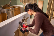 Photo of CRAFTSMAN CMCS351B cordless reciprocating saw cutting drywall during home renovation.