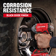 Photo of Craftsman CMMT16078 black oxide finish socket in use with cordless impact wrench on a car wheel lug nut.